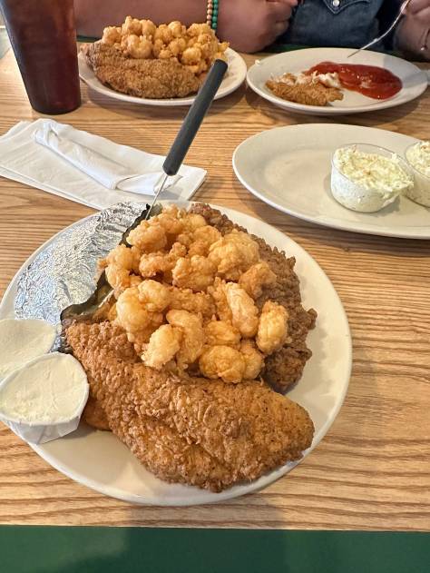 A plate of popcorn shrimp and catfish fried calabash-style